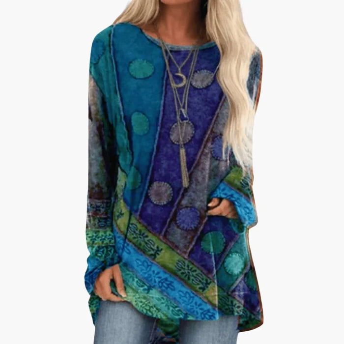 Dames tuniek met lange mouwen en artistiek patchworkpatroon